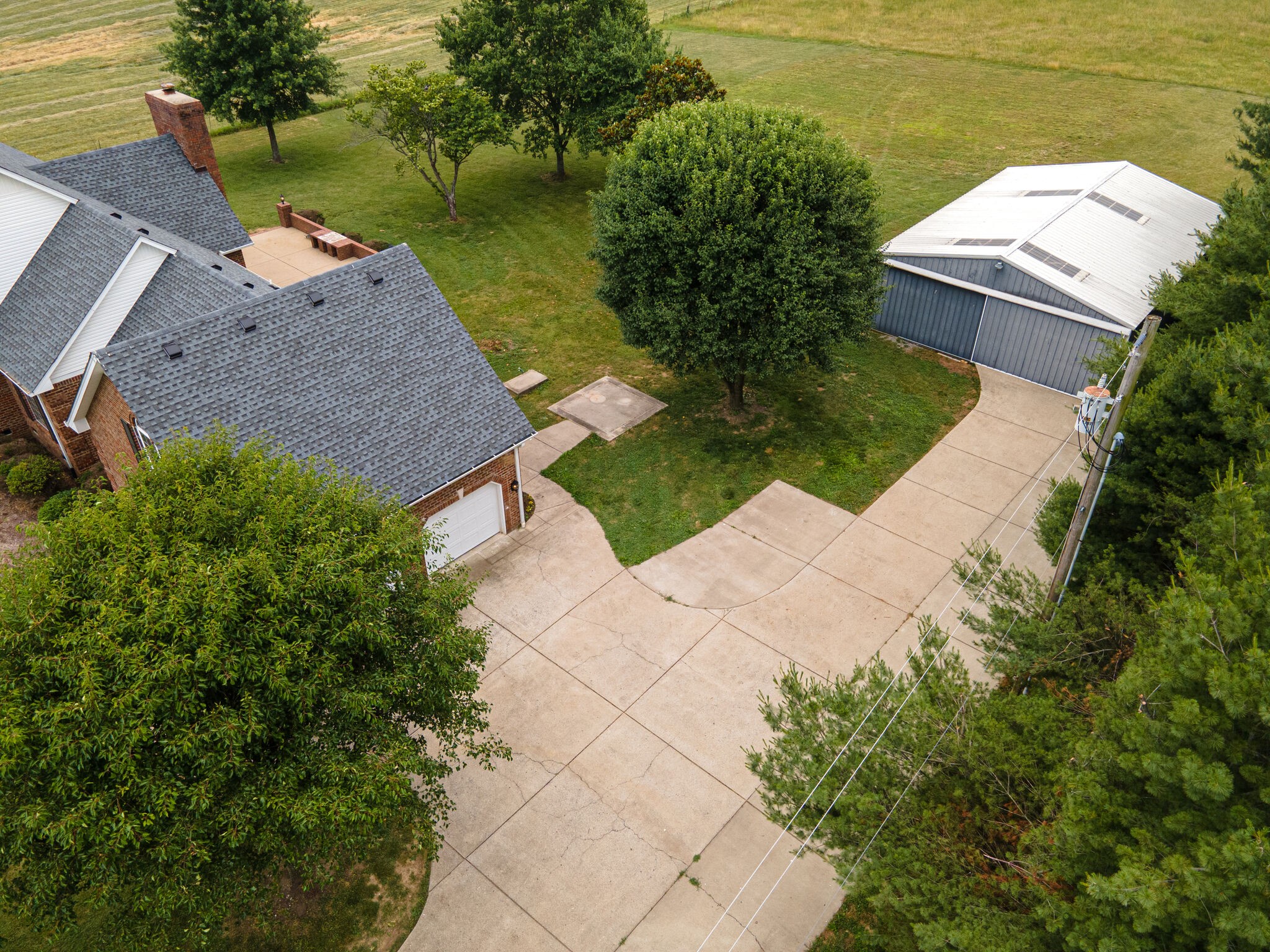 115 Rock Bridge Road Gallatin, TN 37066 - Photo 46 of 70 an aerial view of a house with a yard and lake view