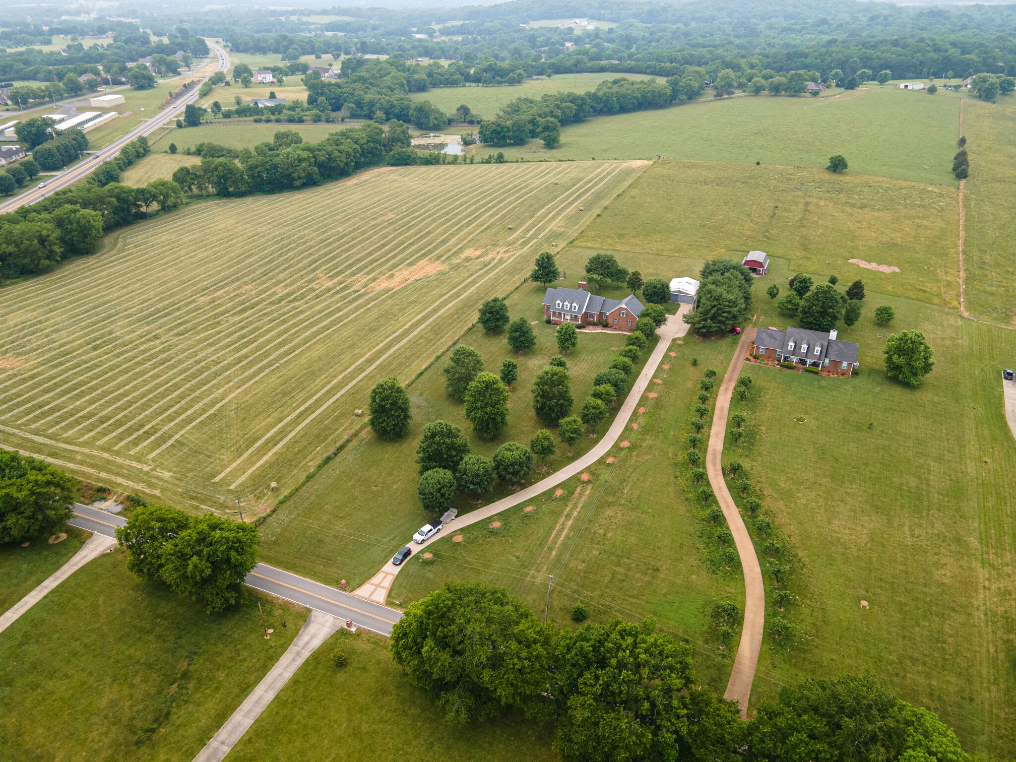 115 Rock Bridge Road Gallatin, TN 37066 - Photo 53 of 70 a view of a swimming pool with a yard and outdoor seating