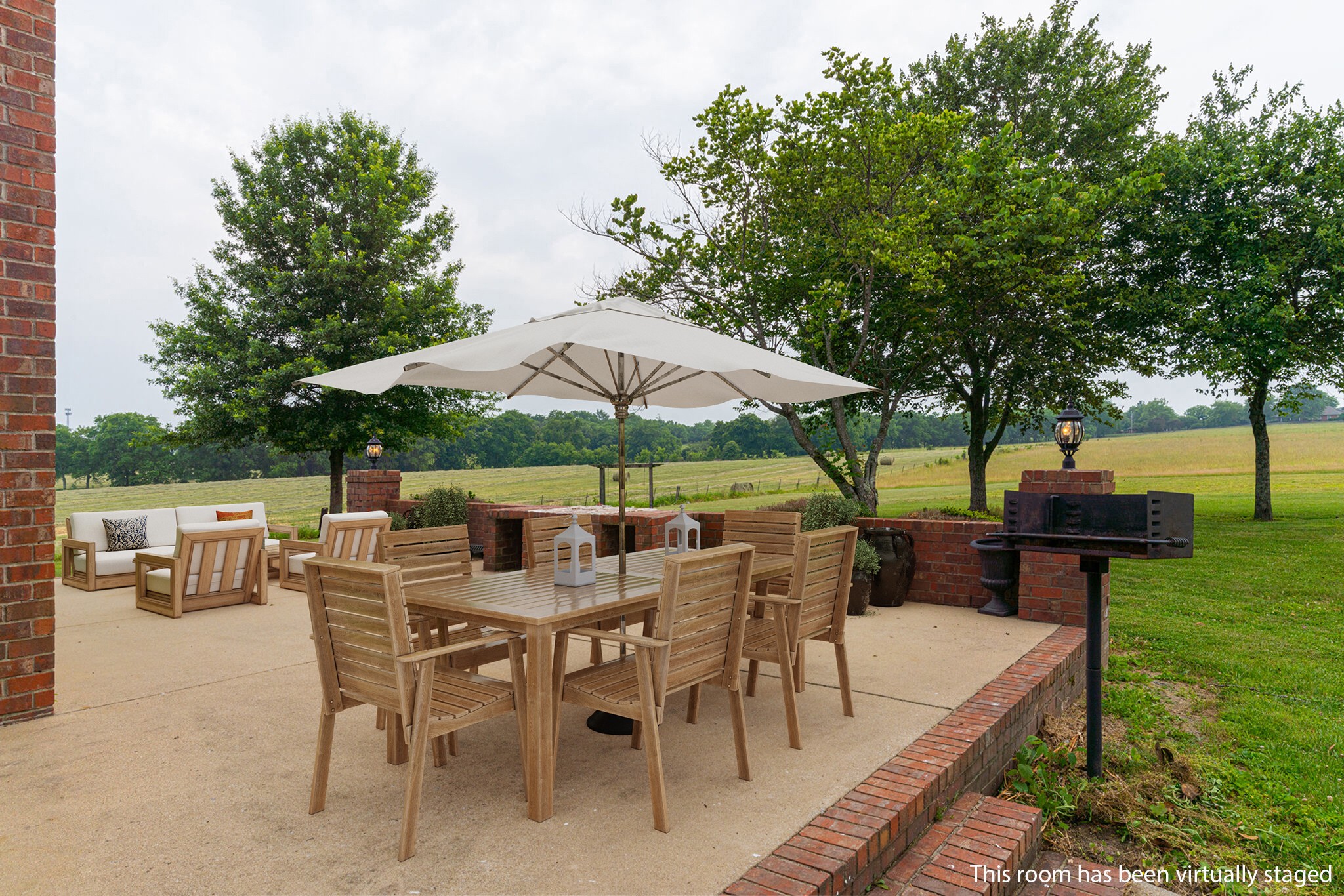 115 Rock Bridge Road Gallatin, TN 37066 - Photo 56 of 70 an outdoor space with furniture and umbrella