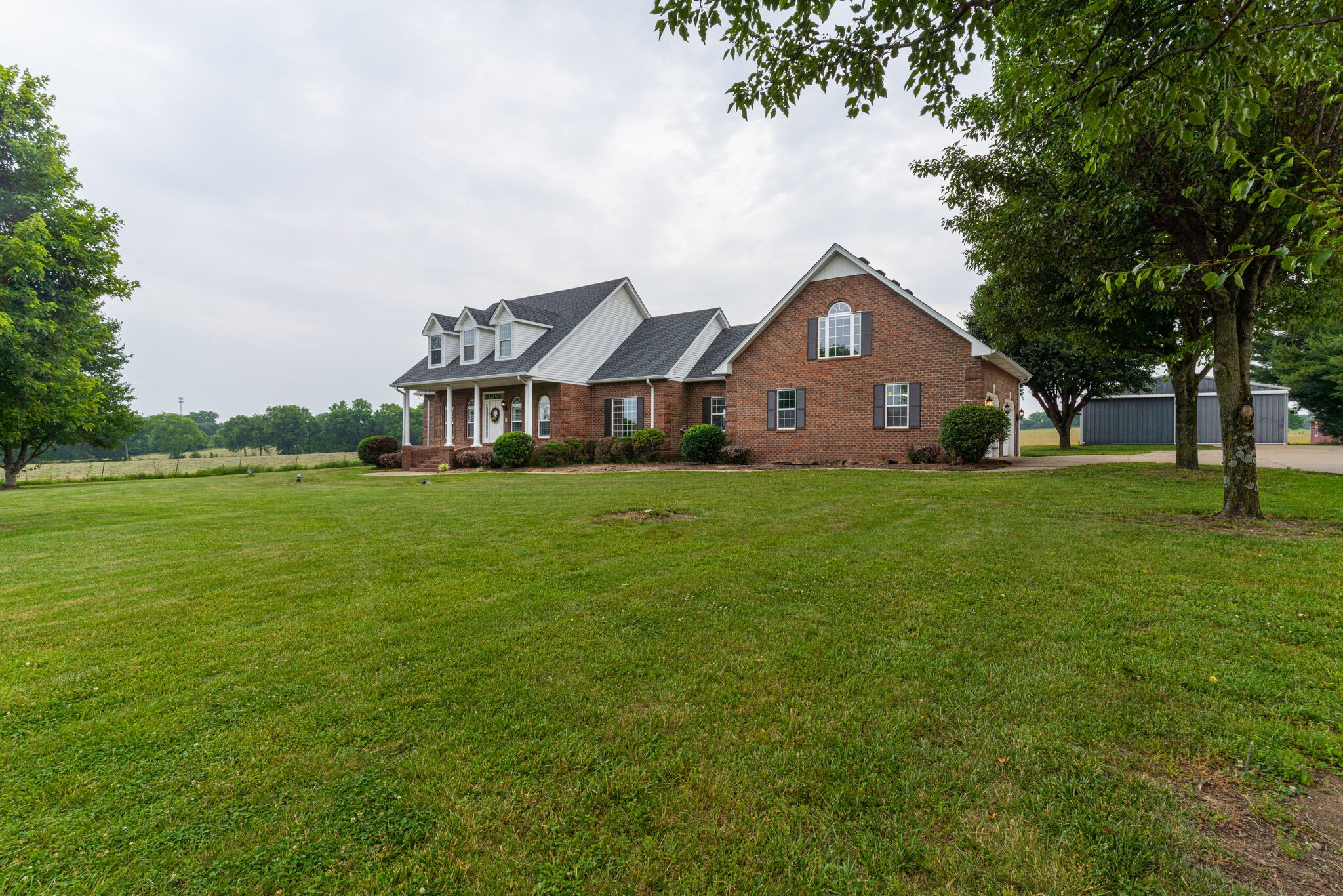 115 Rock Bridge Road Gallatin, TN 37066 - Photo 65 of 70 a front view of a house with a yard