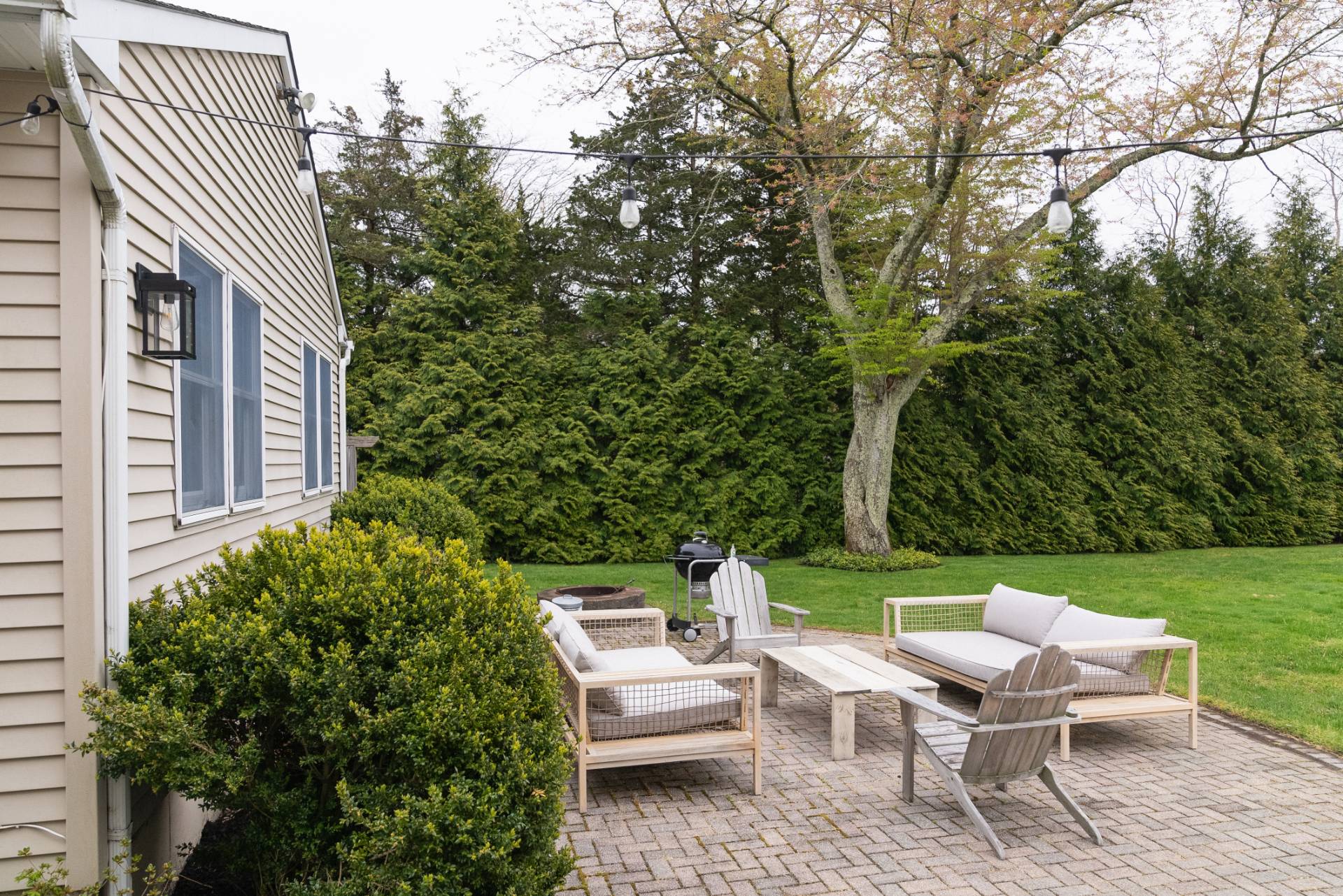 32 Hallock Road East Quogue, NY 11942 - Photo 15 of 24 a view of a patio with a yard
