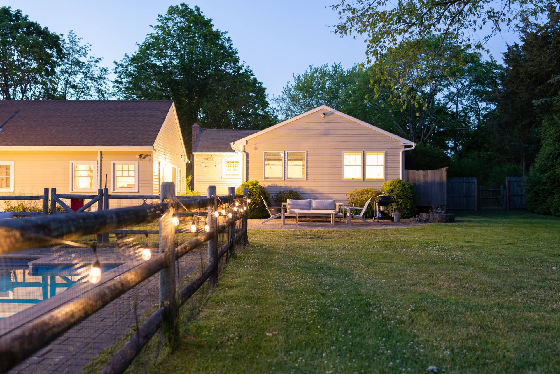 32 Hallock Road East Quogue, NY 11942 - Photo 20 of 24 a view of a house with backyard porch and sitting area