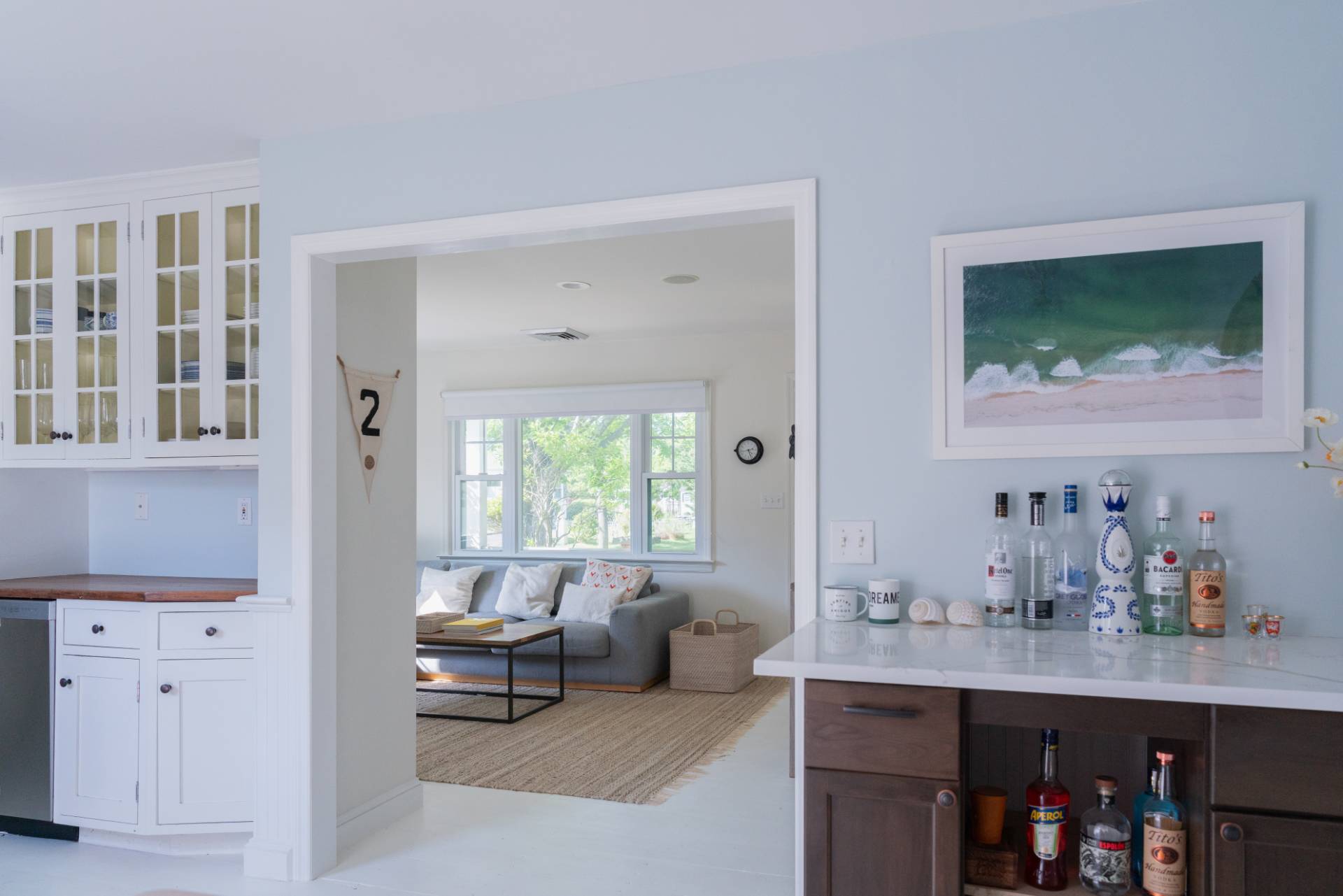 32 Hallock Road East Quogue, NY 11942 - Photo 5 of 24 a living room with furniture and a window