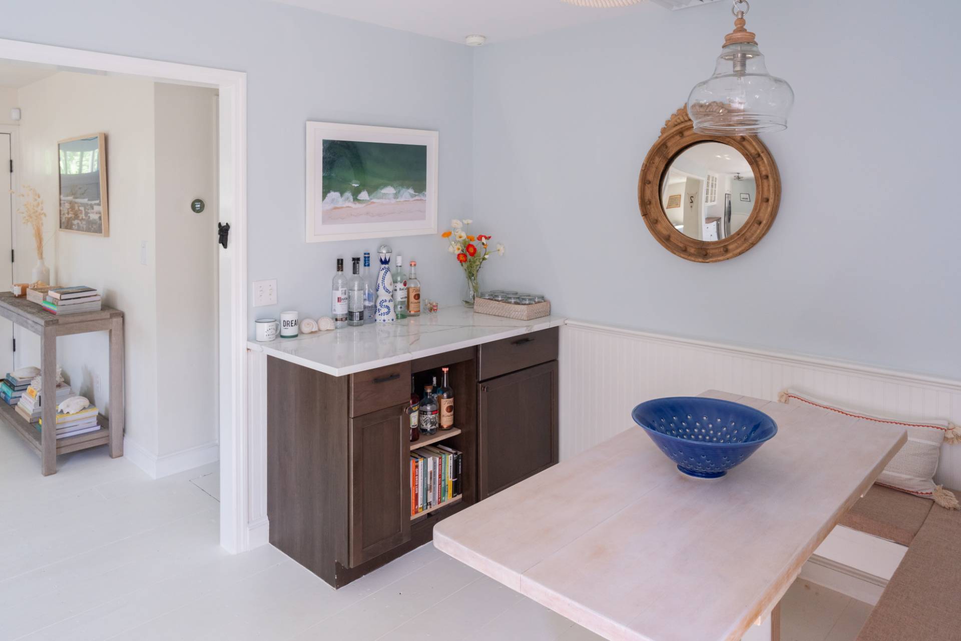 32 Hallock Road East Quogue, NY 11942 - Photo 6 of 24 a bedroom with a bed and a mirror