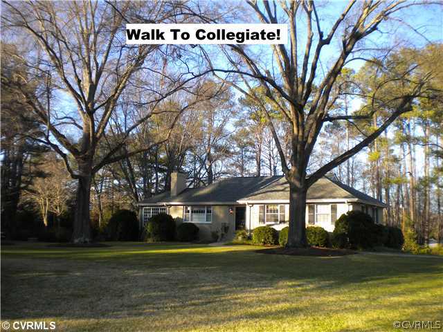 9100 River Road Henrico, VA 23229 - Photo 1 of 24 a view of a house with large trees