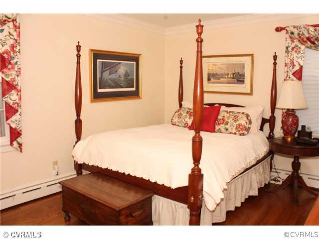 9100 River Road Henrico, VA 23229 - Photo 12 of 24 a bedroom with a bed and a table