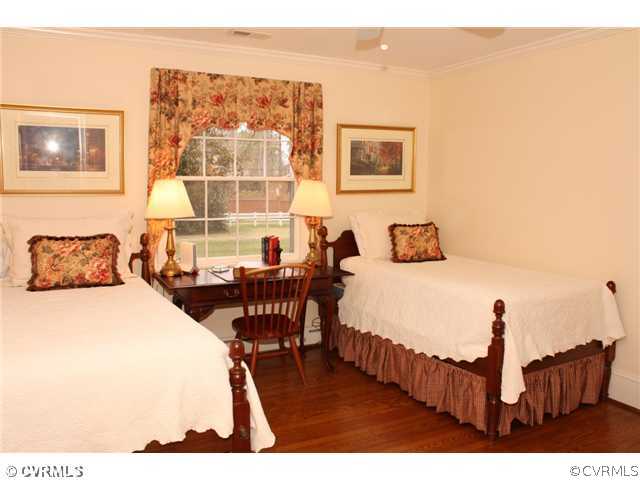9100 River Road Henrico, VA 23229 - Photo 13 of 24 a bedroom with furniture and a window