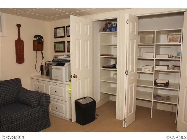 9100 River Road Henrico, VA 23229 - Photo 19 of 24 a kitchen with cabinets and window