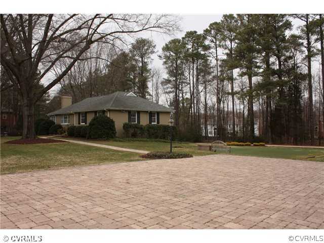 9100 River Road Henrico, VA 23229 - Photo 21 of 24 a view of a house with a yard and sitting area