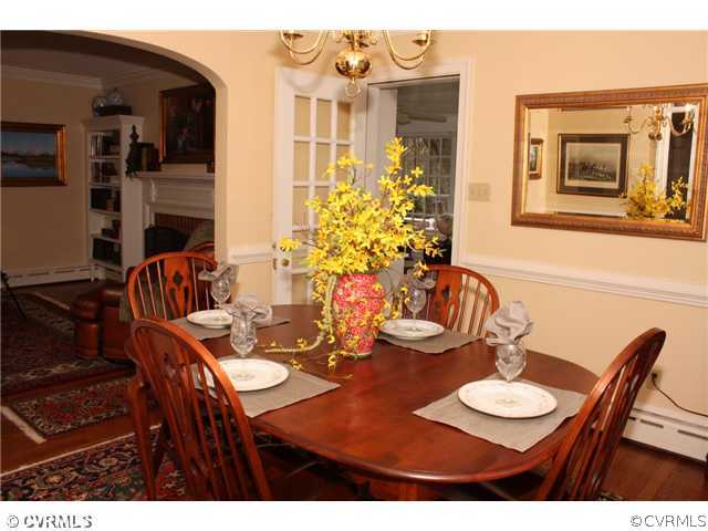 9100 River Road Henrico, VA 23229 - Photo 4 of 24 a view of a dining room with furniture and wooden floor