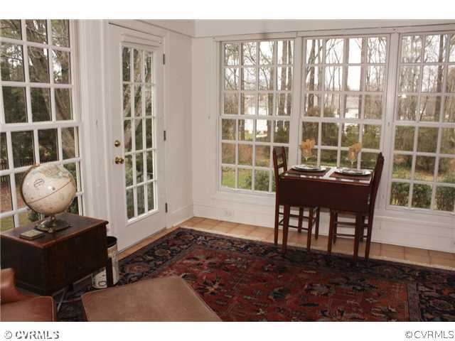 9100 River Road Henrico, VA 23229 - Photo 5 of 24 a living room with furniture and a floor to ceiling window