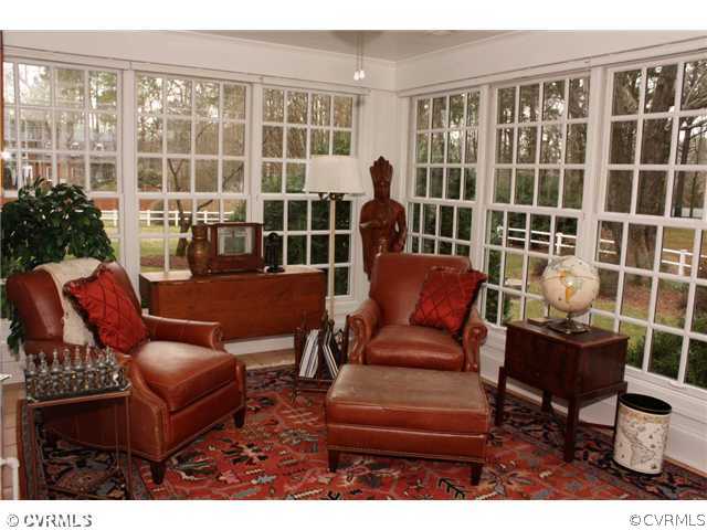 9100 River Road Henrico, VA 23229 - Photo 6 of 24 a living room with furniture and a floor to ceiling window