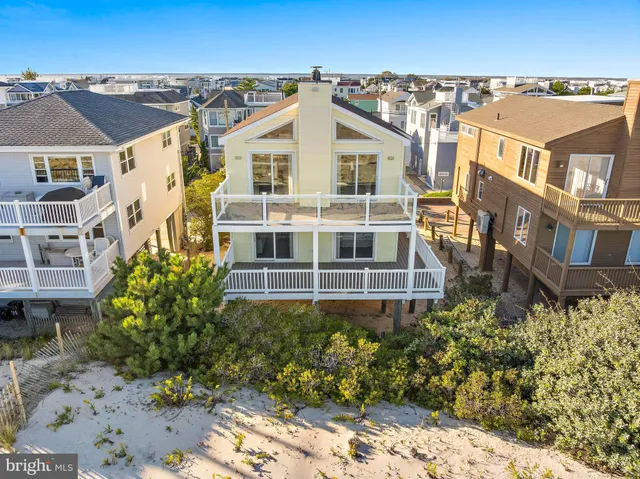 a view of a large building with a yard