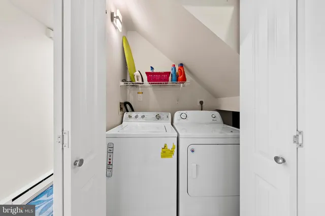 a utility room with dryer and washer
