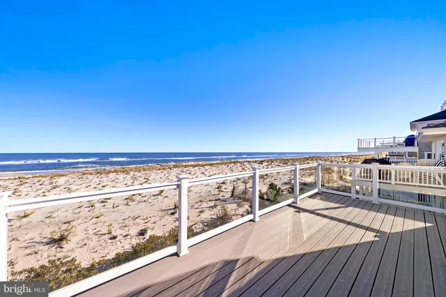 a view of balcony with wooden floor