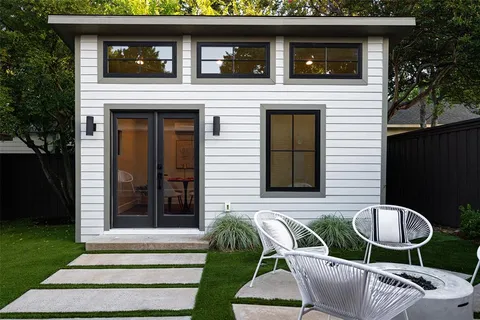 a front view of a house with patio