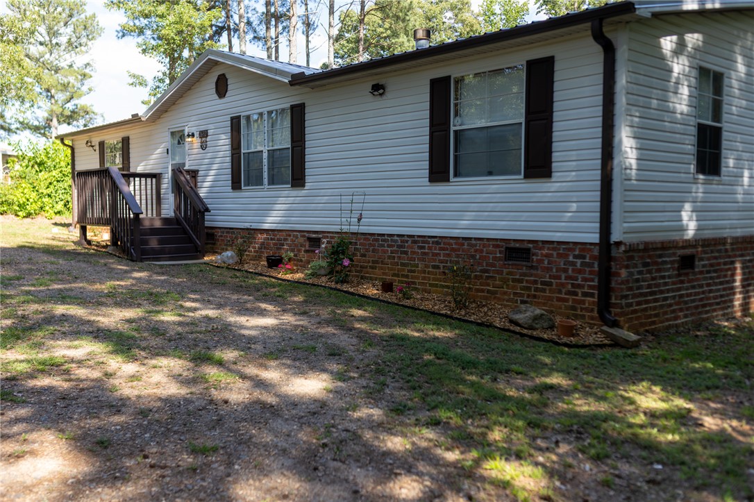 2632 Broadway Lake Road Anderson, SC 29621 - Photo 1 of 20 A welcoming front entrance with mature trees for privacy