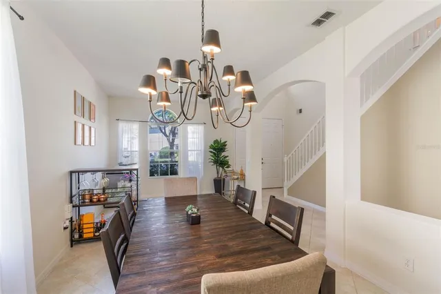 a view of living room and dining room