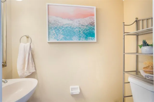 a bathroom with a sink and a toilet