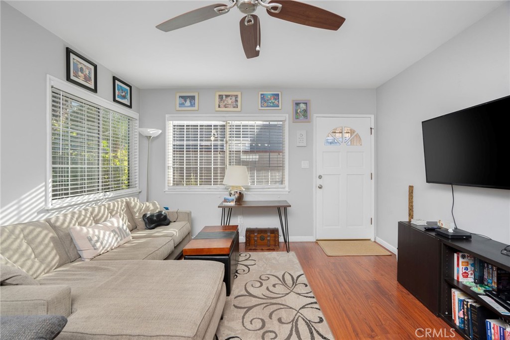 257 5th Street Seal Beach, CA 90740 - Photo 24 of 49 a living room with furniture and a flat screen tv