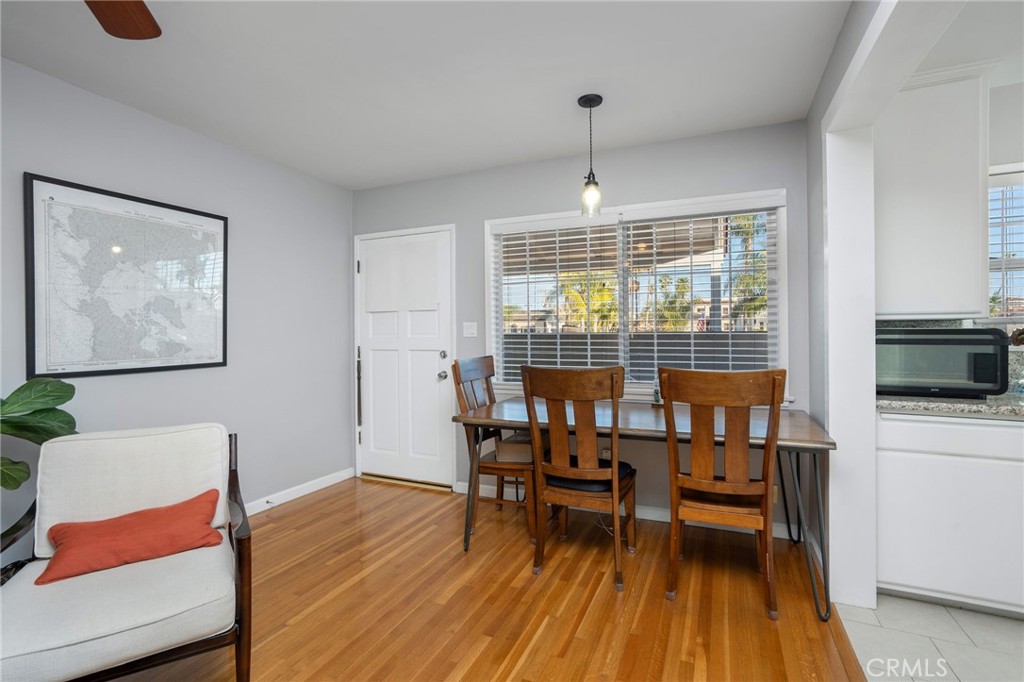 257 5th Street Seal Beach, CA 90740 - Photo 34 of 49 a living room with furniture and a wooden floor