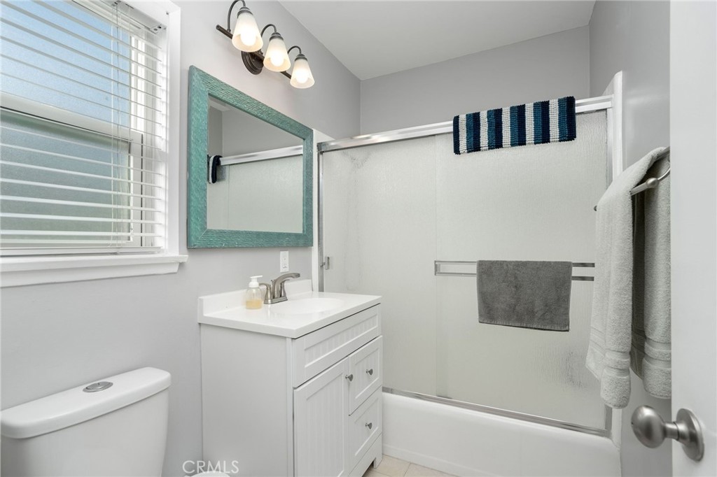 257 5th Street Seal Beach, CA 90740 - Photo 37 of 49 a bathroom with a sink toilet and shower