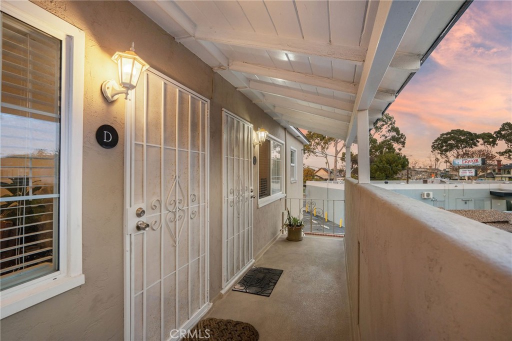 257 5th Street Seal Beach, CA 90740 - Photo 4 of 49 a view of a house with a porch
