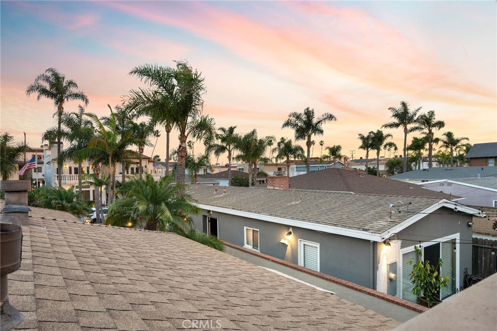 257 5th Street Seal Beach, CA 90740 - Photo 5 of 49 a view of a house with a swimming pool