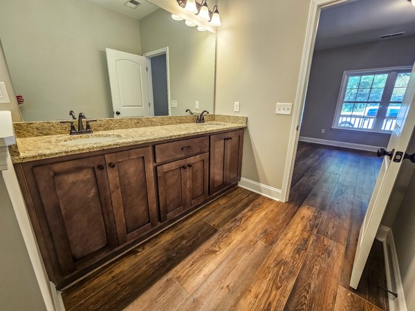 3177 Rodgers Creek Road Ellijay, GA 30540 - Photo 20 of 31 a bathroom with a sink and a mirror