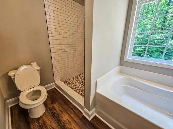 3177 Rodgers Creek Road Ellijay, GA 30540 - Photo 23 of 31 a bathroom with a toilet and a bathtub