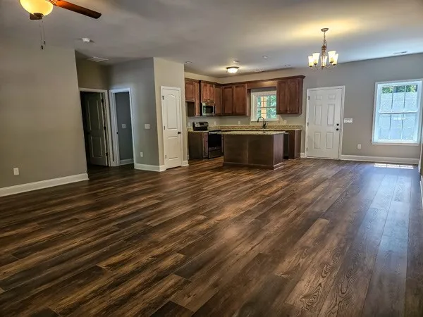 a view of kitchen with wooden floor