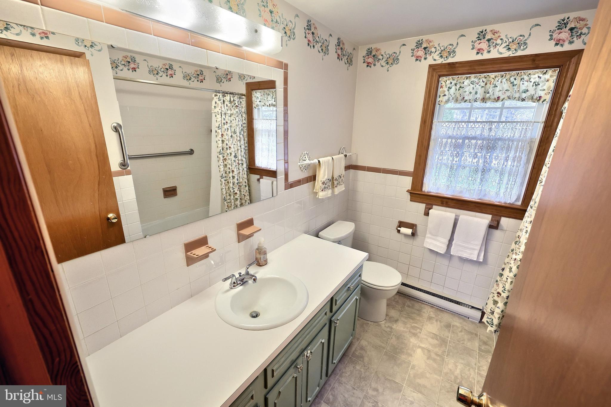 358 Three Hill Road Spring Grove, PA 17362 - Photo 23 of 50 a bathroom with a sink a toilet and shower