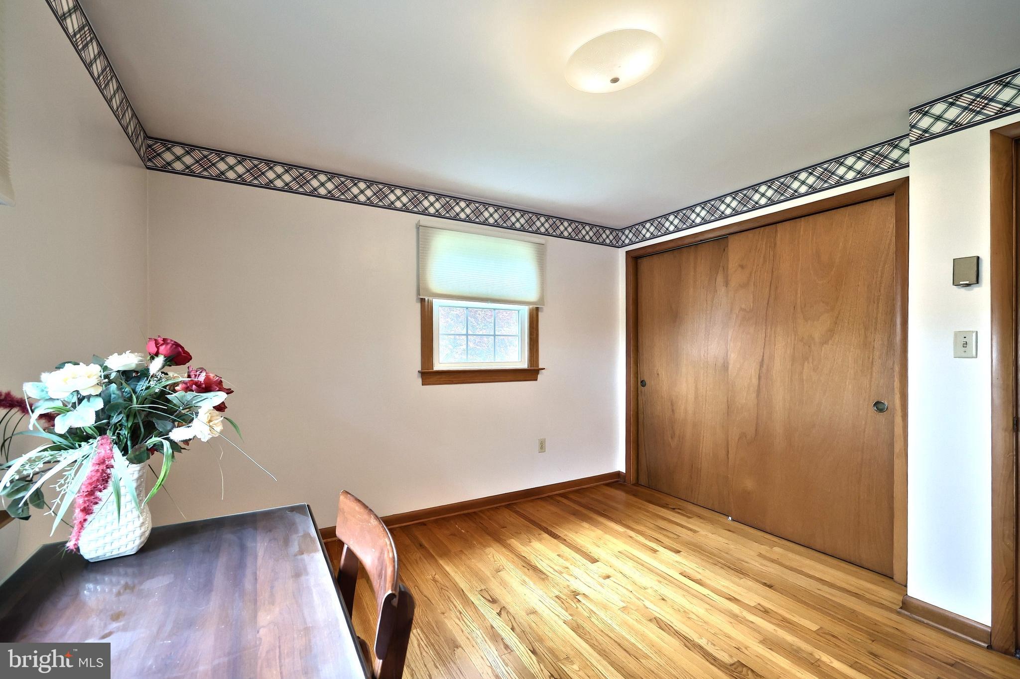 358 Three Hill Road Spring Grove, PA 17362 - Photo 26 of 50 a view of empty room with wooden floor