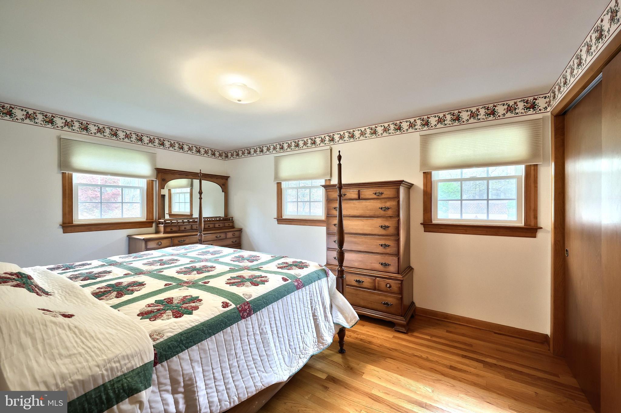 358 Three Hill Road Spring Grove, PA 17362 - Photo 27 of 50 a bedroom with a bed and a dresser