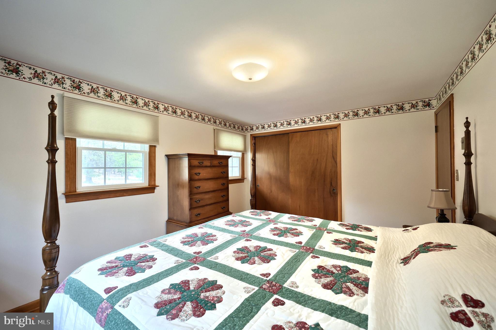 358 Three Hill Road Spring Grove, PA 17362 - Photo 28 of 50 a bedroom with a bed and a dresser