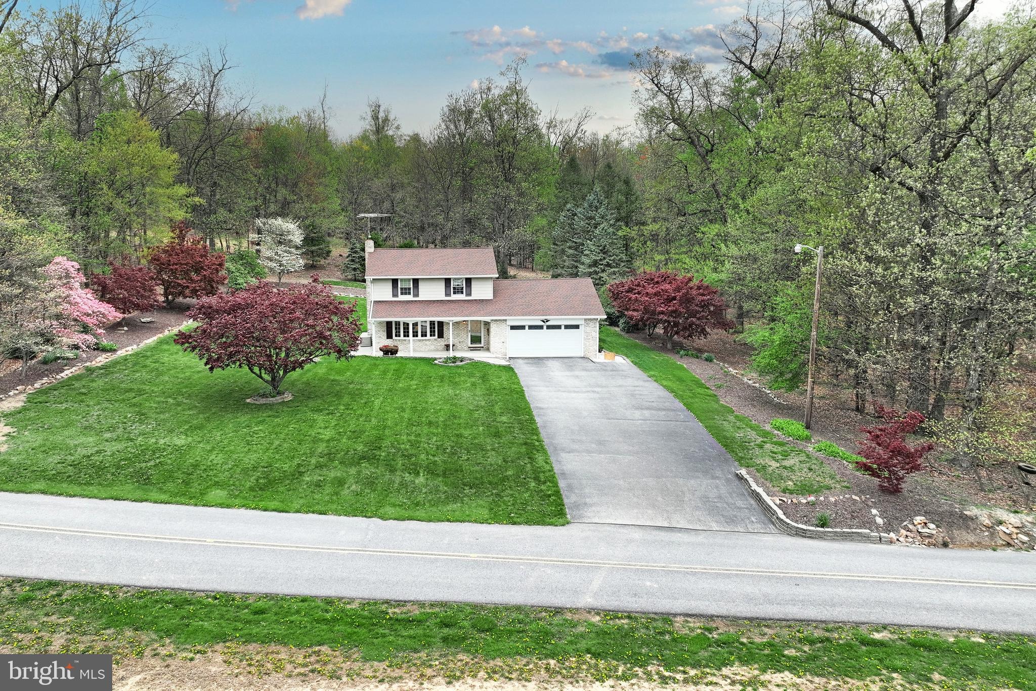 358 Three Hill Road Spring Grove, PA 17362 - Photo 3 of 50 a view of a patio with a yard