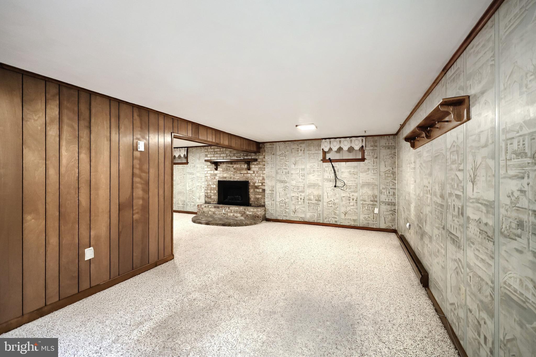 358 Three Hill Road Spring Grove, PA 17362 - Photo 34 of 50 a view of a livingroom with an empty space and a fireplace