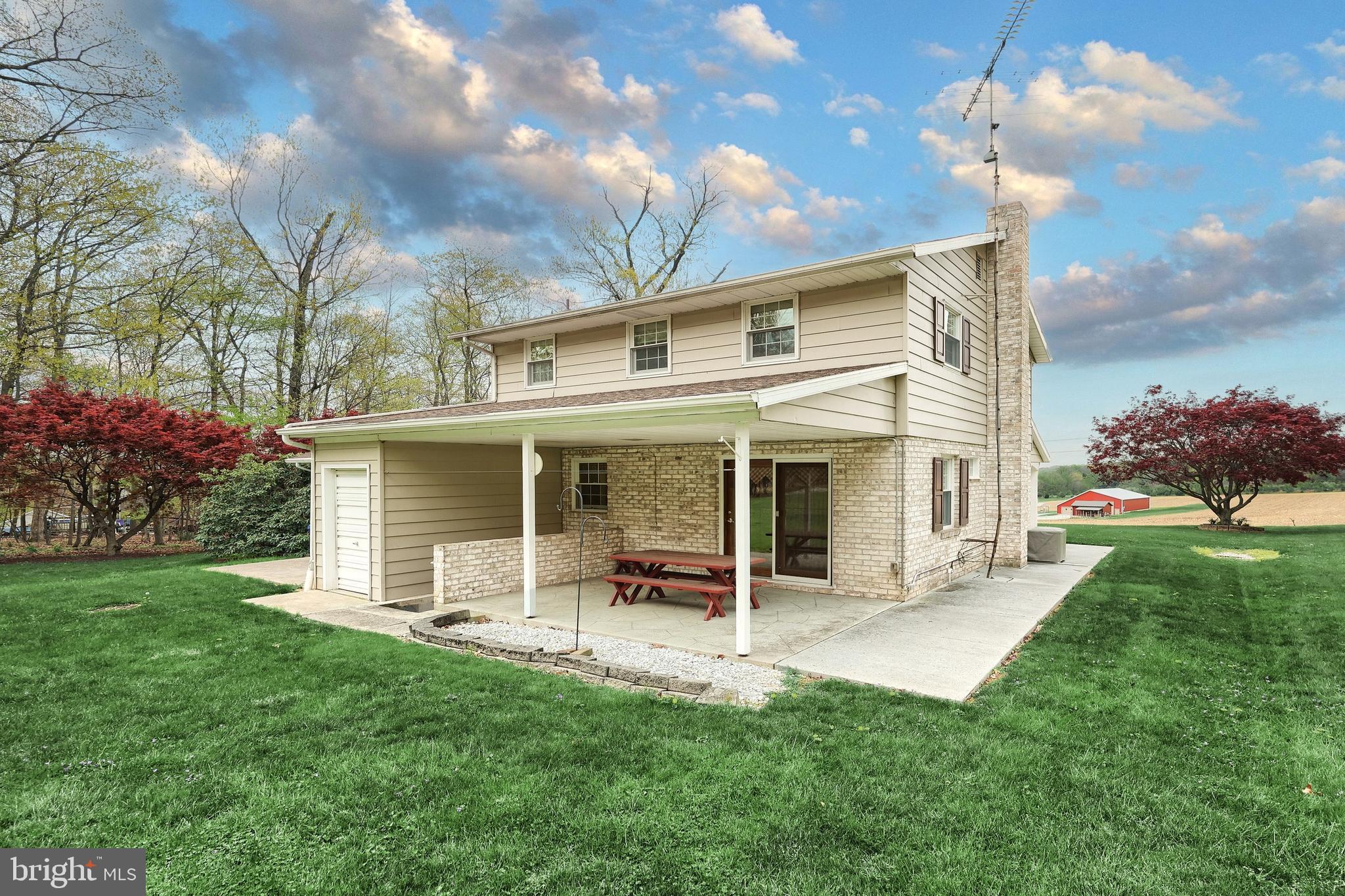 358 Three Hill Road Spring Grove, PA 17362 - Photo 40 of 50 a view of a house with backyard porch and garden