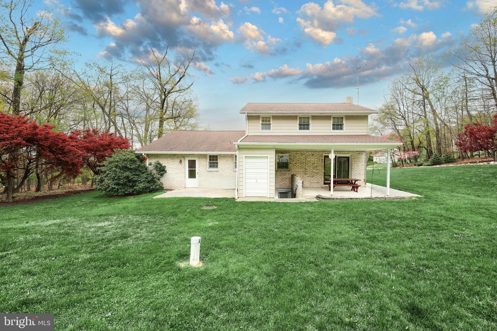 358 Three Hill Road Spring Grove, PA 17362 - Photo 41 of 50 a front view of a house with a yard