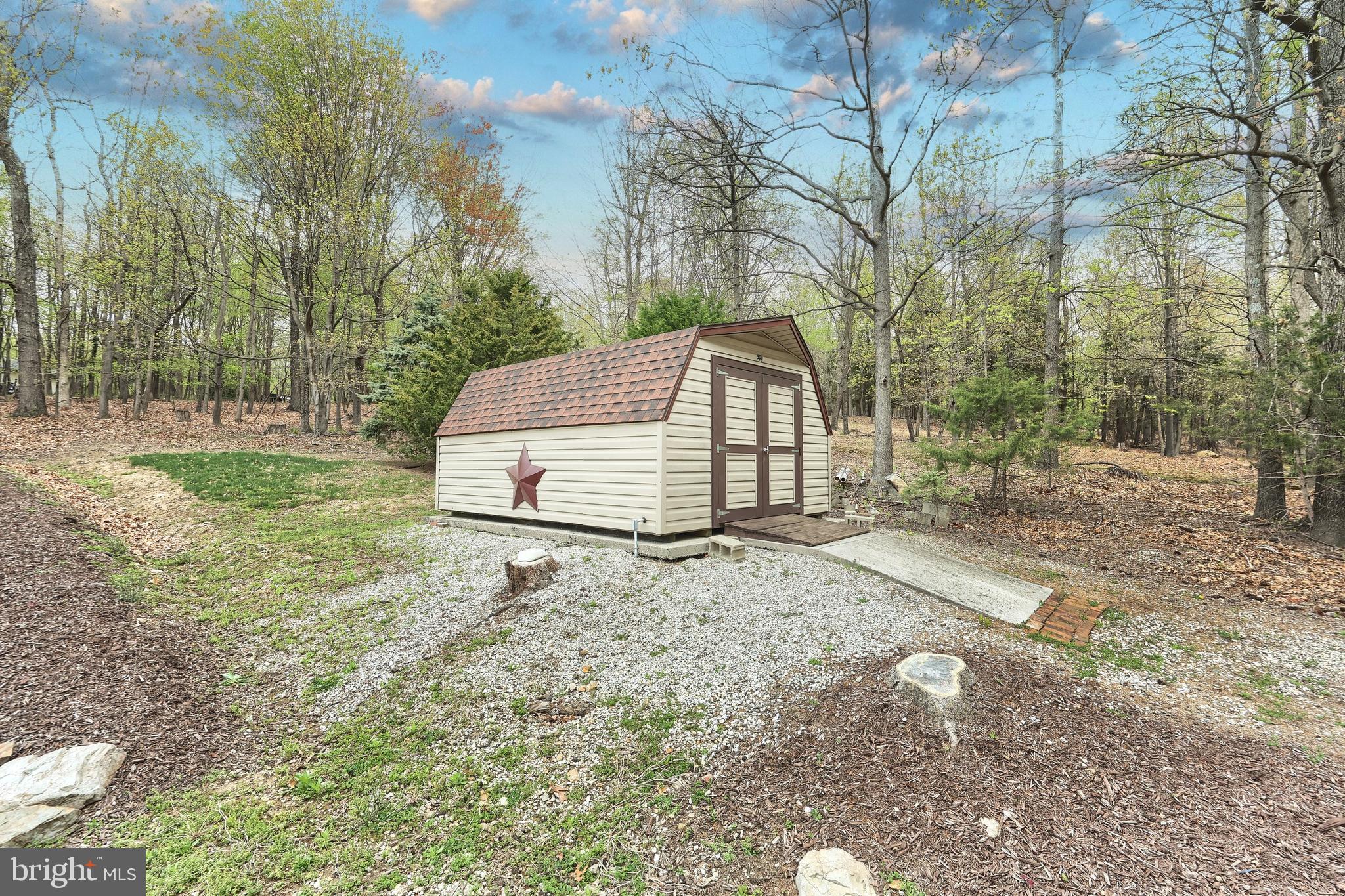 358 Three Hill Road Spring Grove, PA 17362 - Photo 43 of 50 a view of a backyard with large trees