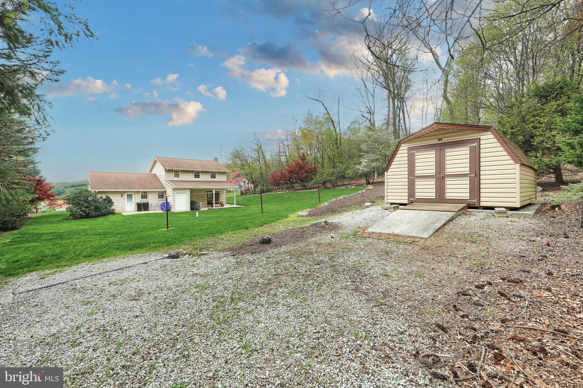 358 Three Hill Road Spring Grove, PA 17362 - Photo 44 of 50 a view of a house with a yard and large tree