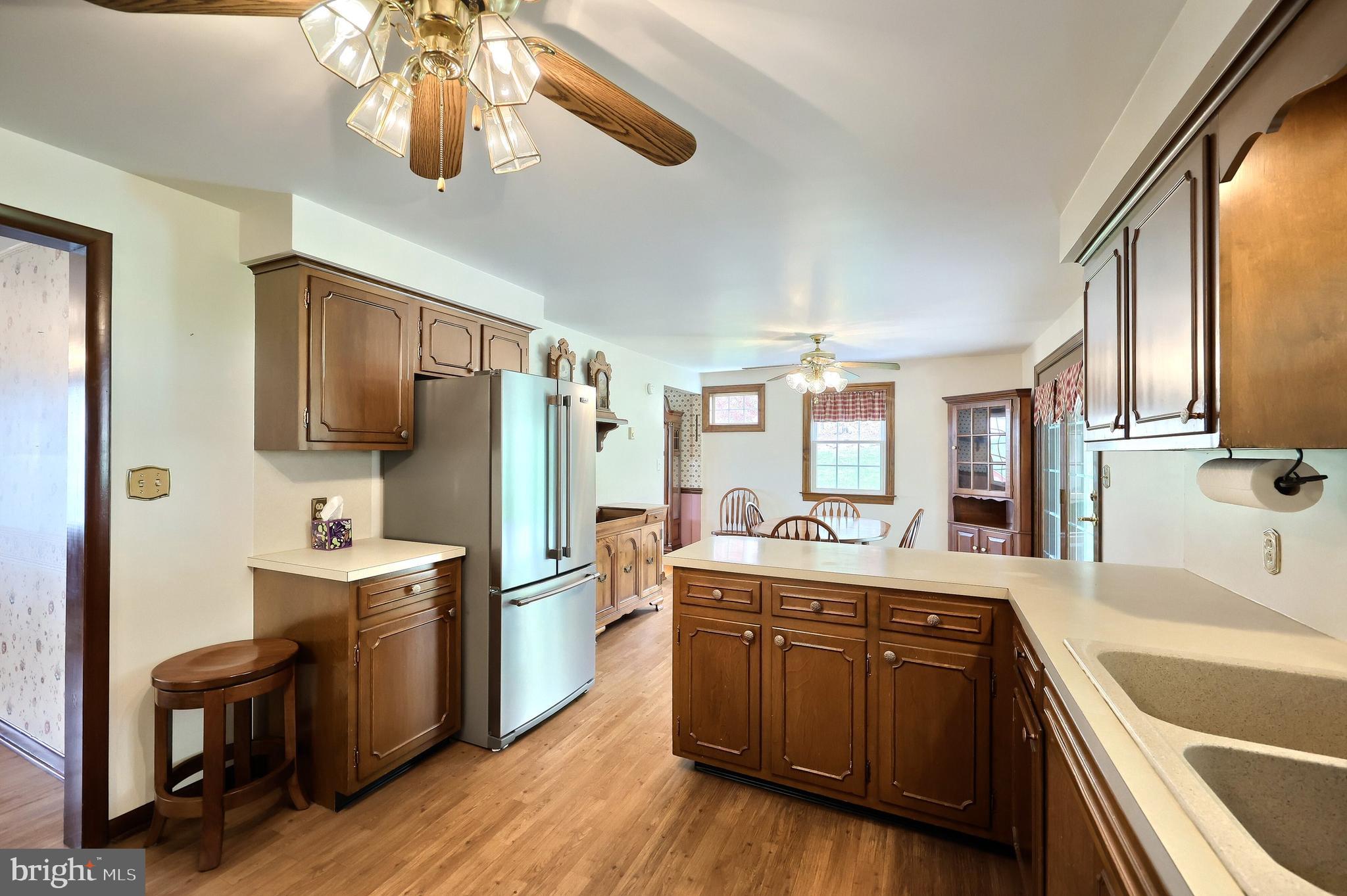 358 Three Hill Road Spring Grove, PA 17362 - Photo 10 of 50 a large kitchen with a sink appliances and cabinets