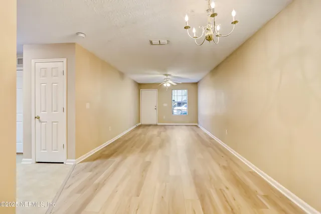 a kitchen with stainless steel appliances granite countertop a stove a sink dishwasher and a refrigerator