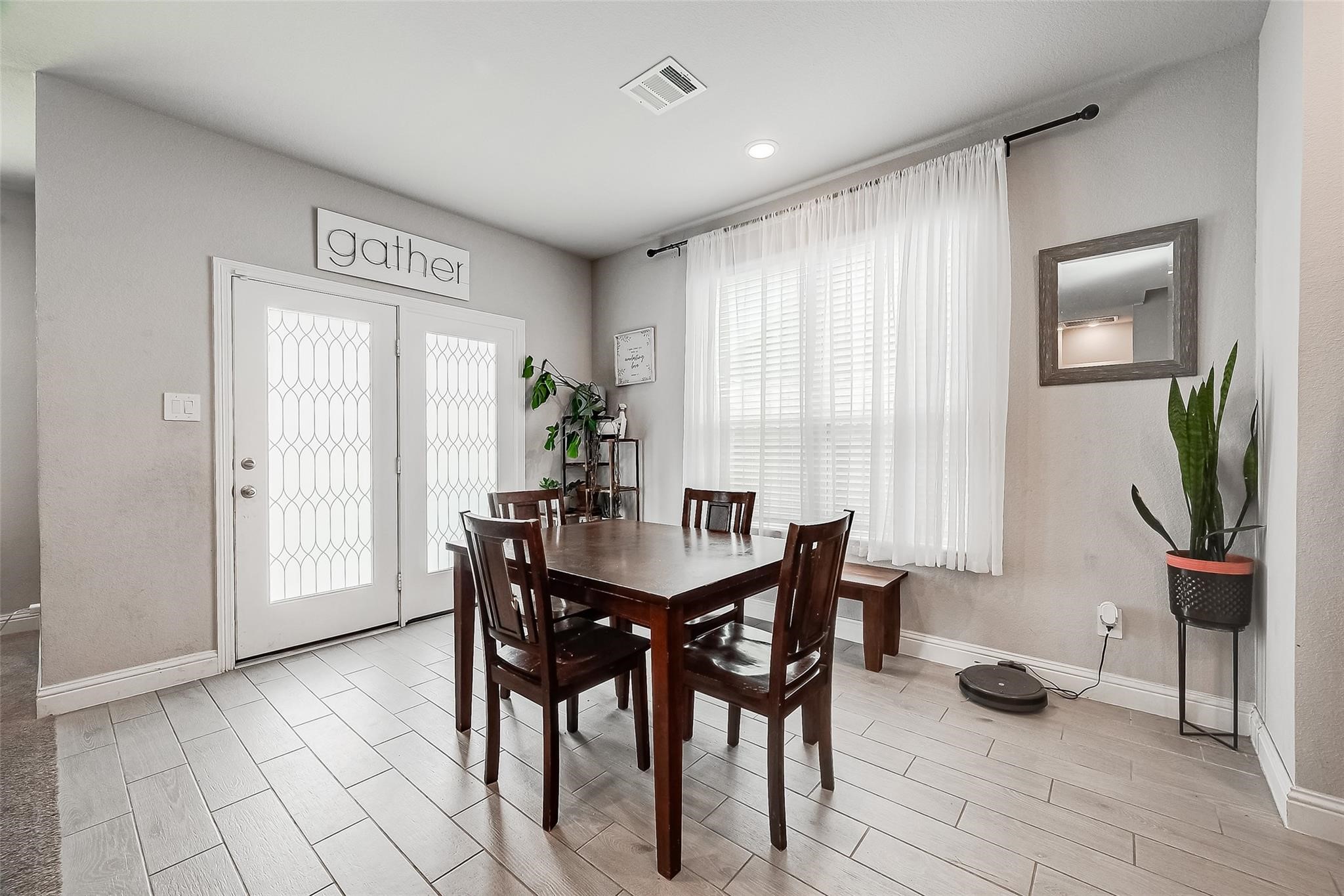 4731 Seabourne Landing Drive Rosenberg, TX 77469 - Photo 16 of 49 a view of a dining room with furniture window and wooden floor