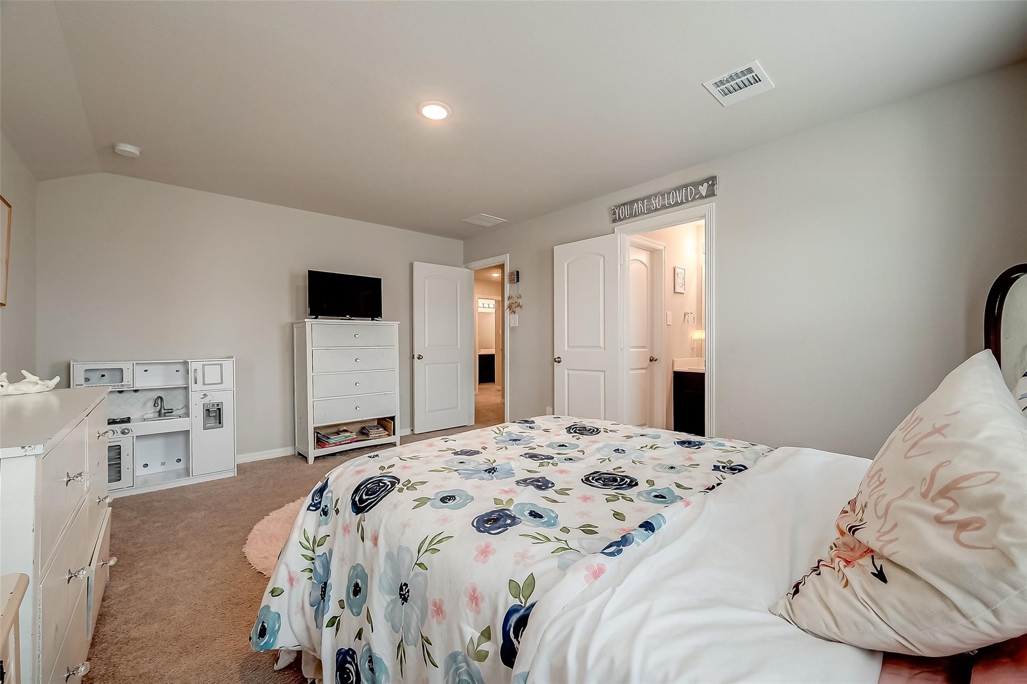 4731 Seabourne Landing Drive Rosenberg, TX 77469 - Photo 31 of 49 a bedroom with a bed and a dresser