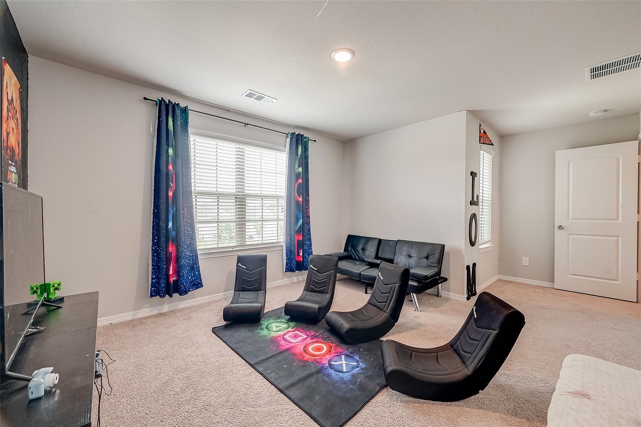 4731 Seabourne Landing Drive Rosenberg, TX 77469 - Photo 41 of 49 a living room with furniture and a window