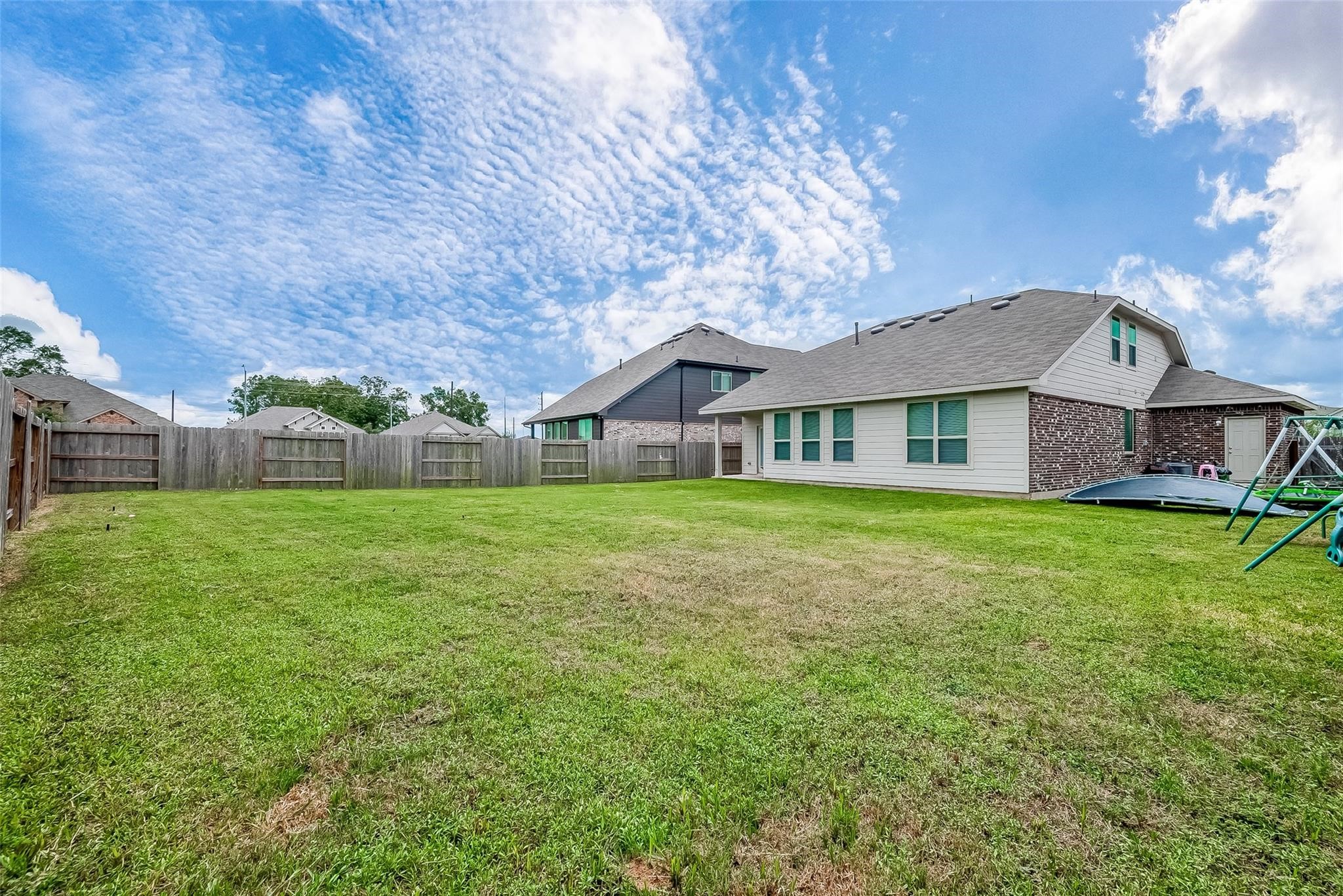 4731 Seabourne Landing Drive Rosenberg, TX 77469 - Photo 46 of 49 a view of a house with a yard