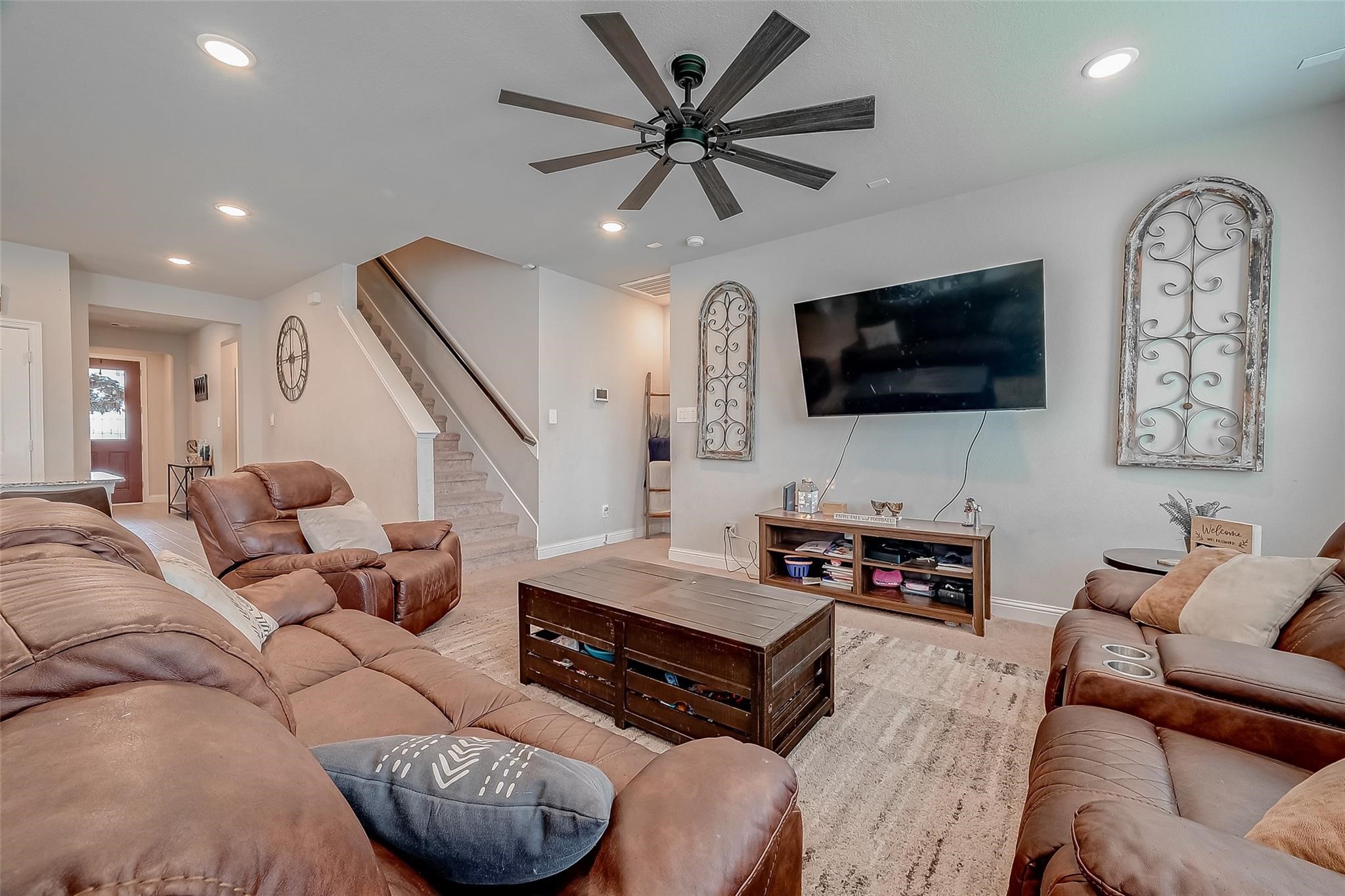 4731 Seabourne Landing Drive Rosenberg, TX 77469 - Photo 8 of 49 a living room with furniture and a flat screen tv