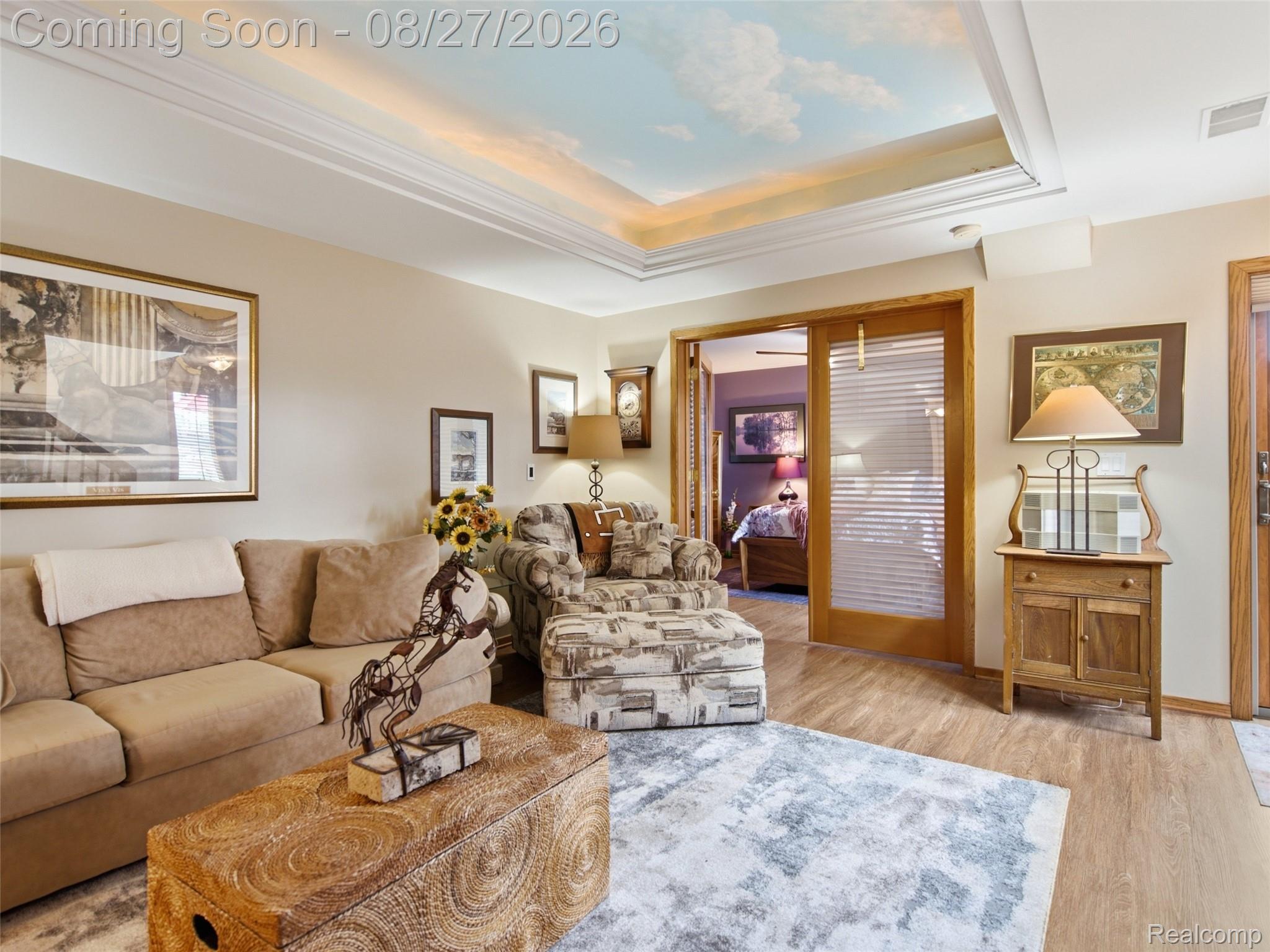 3549 Mann Road Clarkston, MI 48346 - Photo 48 of 63 Architectural Tray Ceiling Enhances the Family Room, with the Private Guest Bedroom Just Beyond