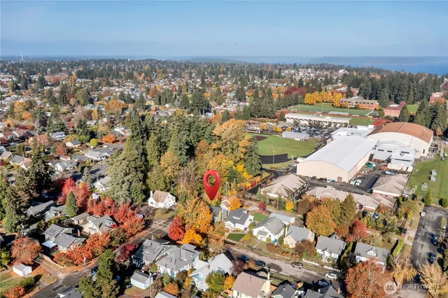 an aerial view of residential houses with outdoor space
